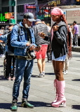 Times Square fan talks with a photographer in Times Square