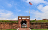 Fifteen-star flag flies over the Sally Port entrance in Fort McHenry NM and HS