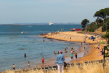 Took tender to Rhyll & shuttle to Cowes - typical beach area. See anchored Regatta in background.