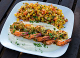 Grilled shrimp on celery root puree with roasted corn salsa