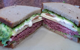 Kobe roast beef, pepper jack cheese, and thick cut bacon with horseradish sauce on (Levys) seeded rye.