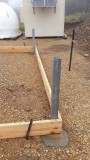 Posts set deep down into rock