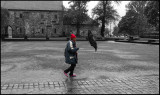 Tourist with umbrella - rainy and windy Trondheim Norway