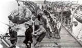 1950 - FRED HARDER, HOISTING THE SEA BOAT..jpg