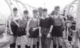 1961 - JOHN McPHERSON, WHALER CREW ON THE BOAT PIER..jpg