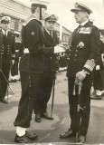 1973 - BILL CHAPMAN, GUARD COMMANDER, LT. CDR. PELTOR, DO HAWKE LOOKING ON, DATE AWAITING CONFIRMATION 1.jpg