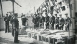 UNDATED - DICKIE DOYLE, SIGNAL BOYS UNDER INSTRUCTION AFLOAT, NOTE LANYARDS TO BREAST POCKET CONTAINING KNIFE.jpg