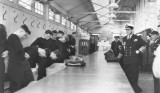 1956 - DICKIE DOYLE, NEW ENTRIES BEING ISSUED WITH THEIR KIT WATCHED BY THE DUKE OF EDINBURGH.jpg