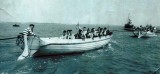 1957 - DAVE GALE, 01 RECR., HAWKE, 48 MESS, CUTTER CREW UNDER TOW, BOB HOOKWAY IS STARBOARD STROKE OAR.jpg