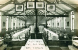 1923 - JIM WORLDING, MESS LAID OUT FOR ROUNDS - NOTE THE OAR.jpg