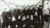 1957 - DAVE GALE, 01 RECR, HAWKE, 48 MESS, WHALER AND CUTTER CREWS ON THE PIER.jpg