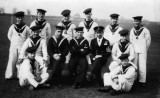 1920-1932 - GROUP OF BOYS WITH INSTRUCTOR BOY AND 2 P.O. INSTRUCTORS.