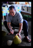 chopping a coconut 
