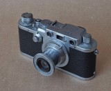 The Leica IIIf; with the classical Elmar 50mm F3.5. Launched in 1950. At that time, it was an advanced and compact camera.      