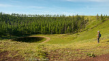 Crater lake at the Uran Uul extinct volcano, northern Mongolia