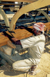 Shipwright working on a dhow keel, Bateen, Abu Dhabi (1998)