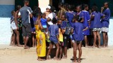 Kids gathered outside a school in the town of Ampangorinana on Nosy Komba