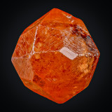 Spessartine, 13 mm orange gemmy crystal. Nani, Loliondo, Arusha Region, Tanzania.