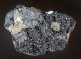 Cerussite with fluorite on galena, Beans and Bacon Mine, Bonsall Moor, 44 mm x 28 mm x 20 mm