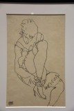 Woman Buttoning Her Shoes (1915) - Egon Schiele - 3050