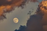 Crazy sunset moon and clouds