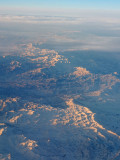 Somewhere over the Himalayas at sunrise