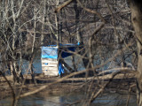 A lean-to on a tiny island in the middle of the river