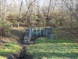 A waste weir on the berm side of the canal