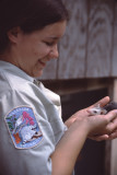 TN naturalist and baby opossum