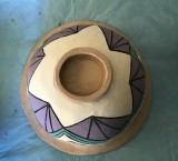 bottom of carved and engobed bowl