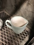 thrown pitcher