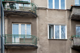 Windows, Balconies And A Cat