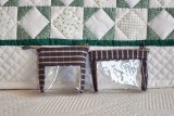 Her Quiltings