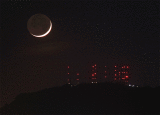 Crescent Moonset Behind South Mountain Towers
