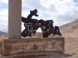 This sign demonstrates the shape of Tajikistan, whose borders were drawn by Stalin.  