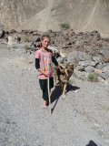 A young shepherdess and her dog