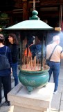 INCENSE IN FRONT OF SHRINE