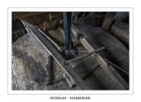 Top view of the wooden case around the grinding stones