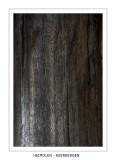Carvings in the post of the mill