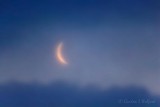 Crescent Moon Between Snow Squall Clouds 90D18373