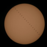 The ISS transits the blank Sun