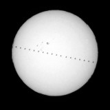 The International Space Station crossing the Sun