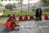 Monks praying t the birthplace of Buddha in Lumbini Nepal