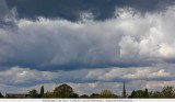 Turnhout - impressive cloud sky with tower of the Heilig Hart church