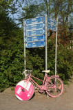 Pink bike along a bike path in Turku