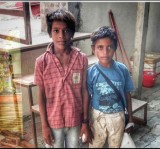 Poor boys helped mother outside longing to see. Police helped them see Athivaradar