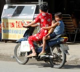 Four on Scooter, Saigon, Vietnam 99  