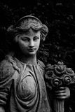 Statue with flowers  