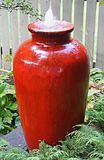 Bubbling red urn.
