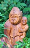 Gorilla with baby, wood sculpture.
